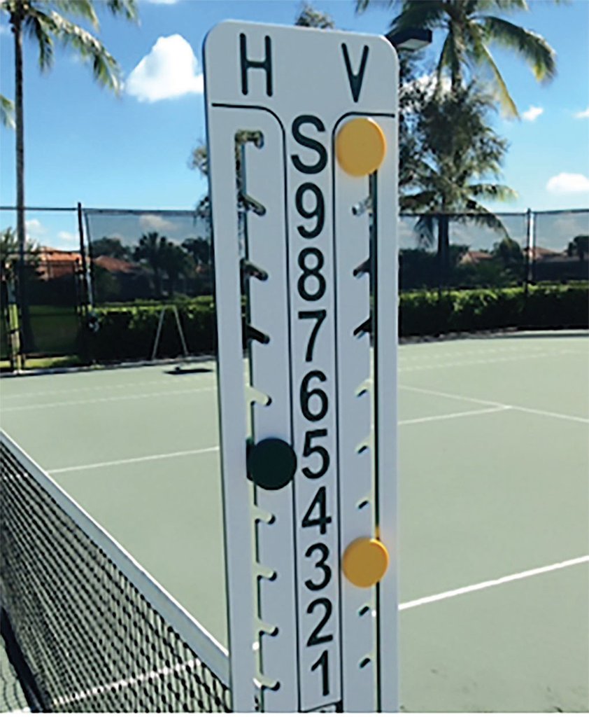 Court-side tennis scoreboard installation.